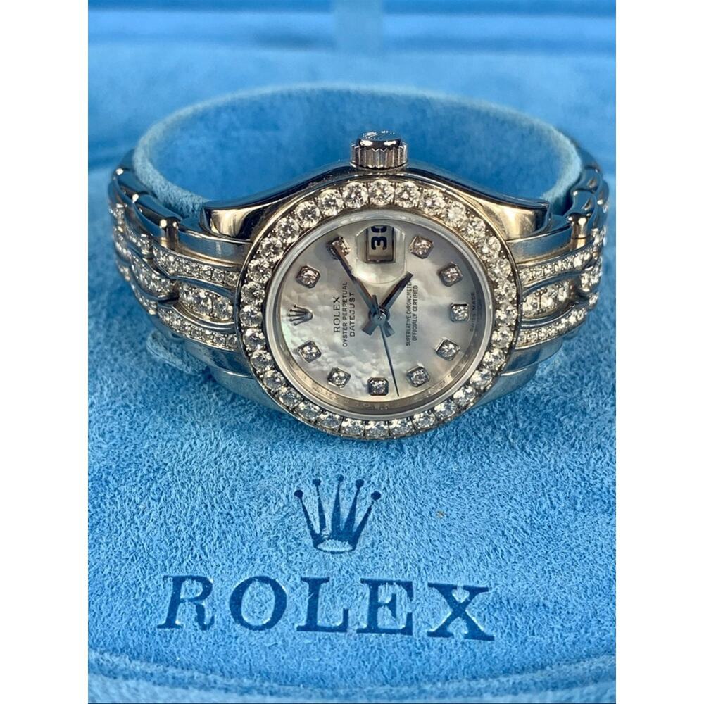 Rolex Ladies Mother-of-Pearl Dial 18 K Diamond Watch band 100 % authentic